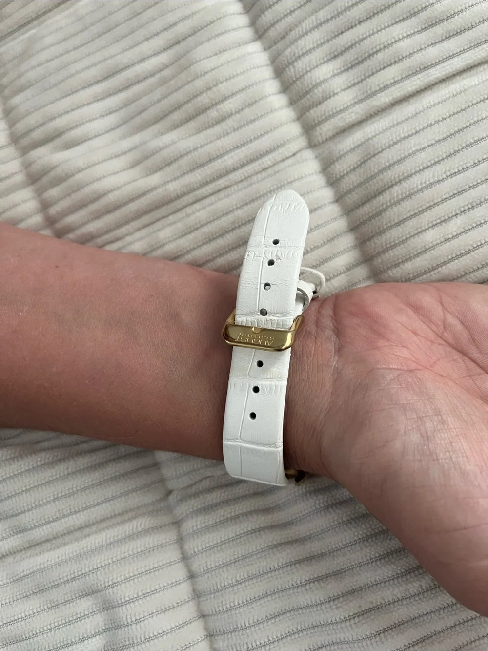 August Steiner diamond watch. New. White leather band.
